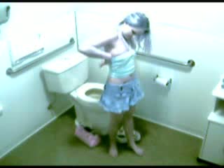 Voyeur masturbation video with long haired gal cumming in toilet