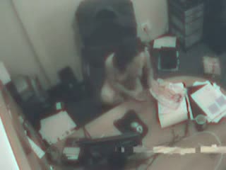 Brunette dildo fucks pussy in the office chair in hidden cam vid