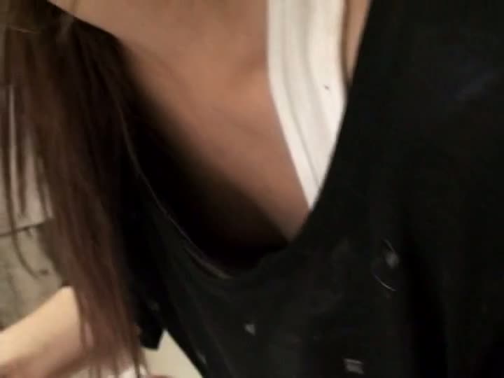 Asian beauty shows her cleavage in this downblouse voyeur video