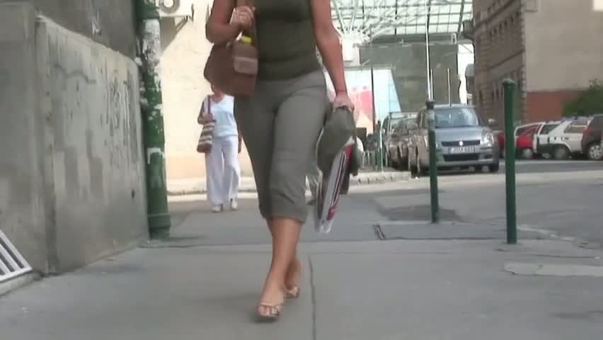 Sexy elegant babe in street candid video