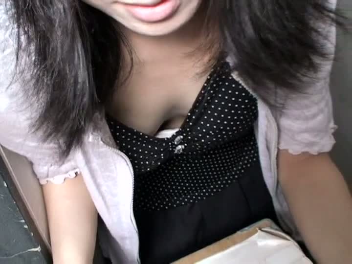 Mature Asian shows her small tits in this cleavage spy shot