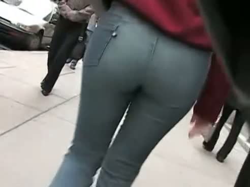 Good ass girl walks down the street moving her butt right