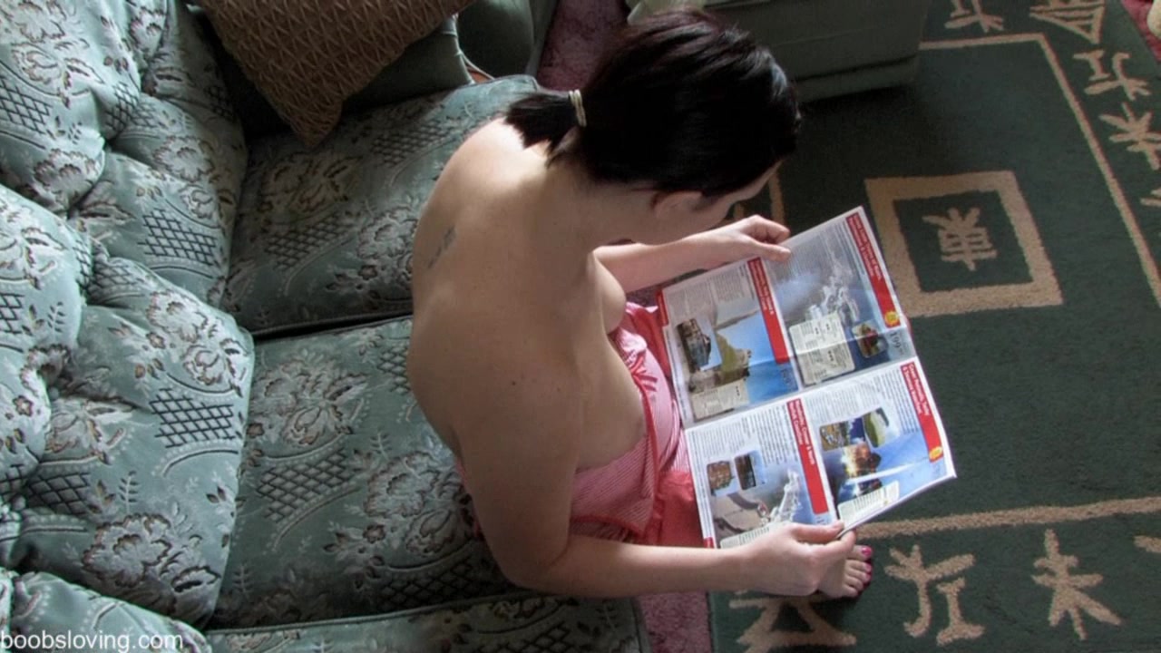 Lovely brunette reads and shows tits in down blouse style