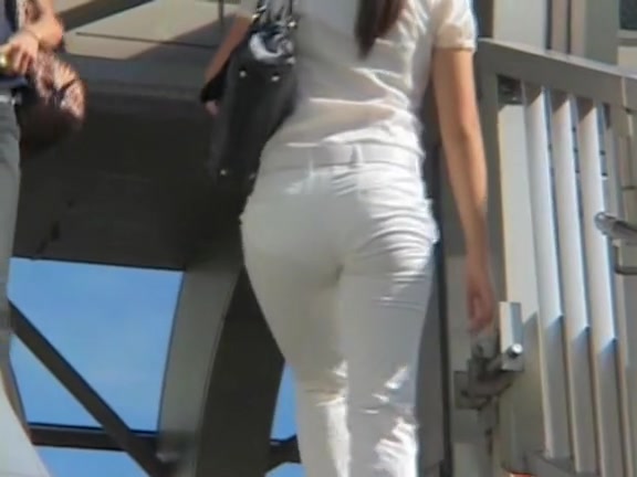 Candid street shots of cute teen in tight white jeans