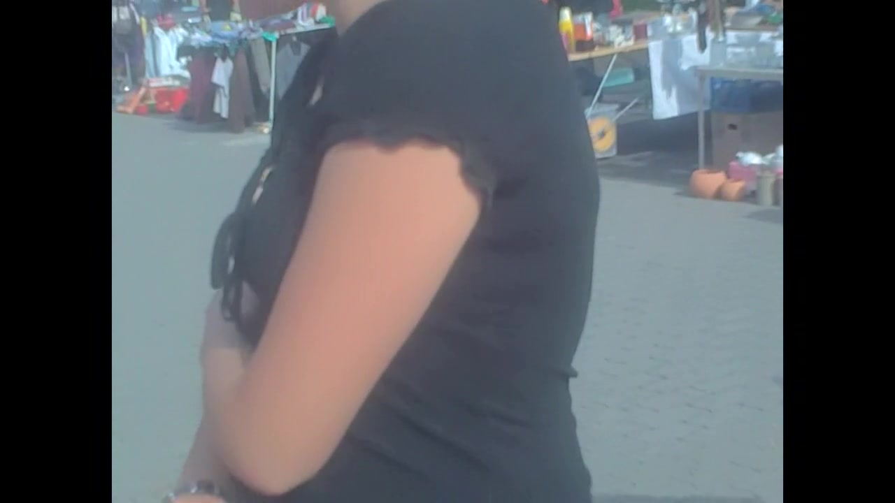 Look down the blouse of the amateur in the street