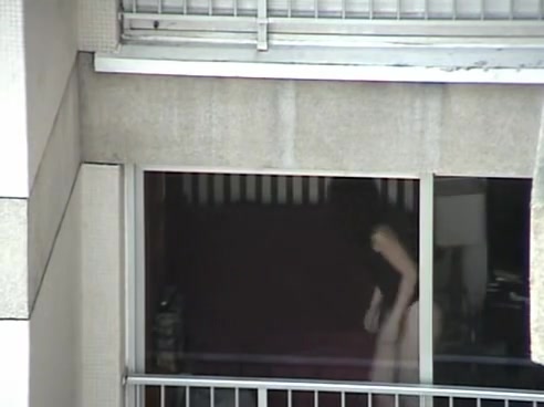 Opened window allows us voyeur babes ass in thong
