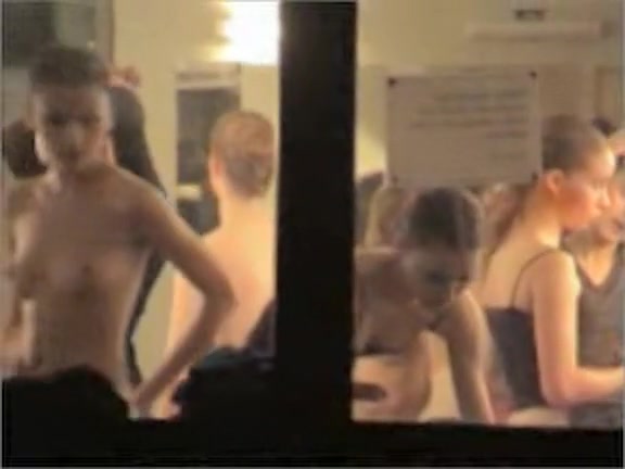 Cute ballet dancers voyeured half nude through the window