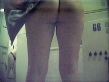 Hidden cam records naked European babes in a changing room.