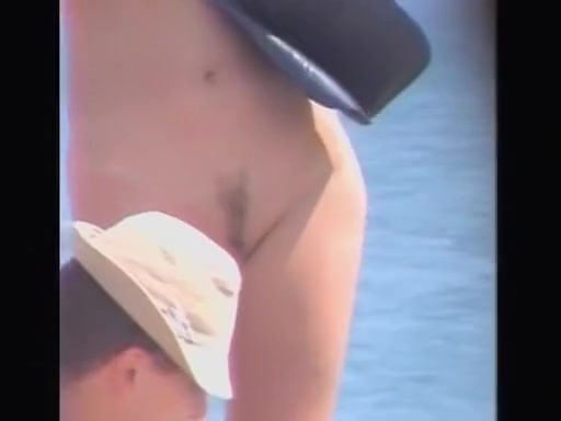 Horny voyeur enjoys the hot view on the nude beach