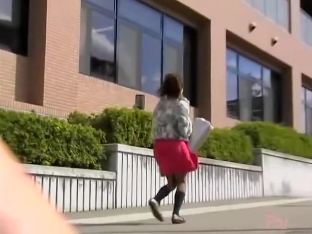 Sharking video with a lovely Japanese girl sitting outdoors