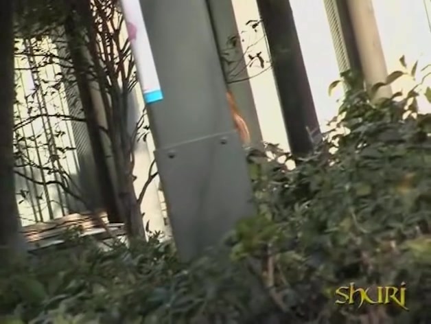 Japanese sharking video of a cute gal sitting in a park
