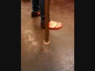Feet in a metro train VII