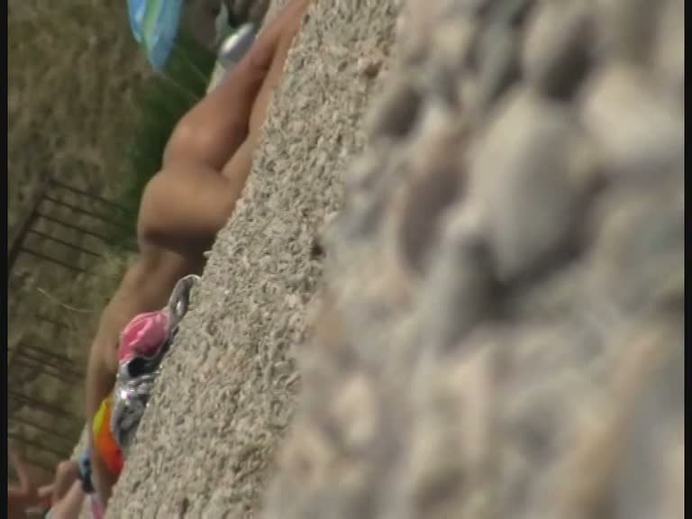 Real beach voyeur video of sluts