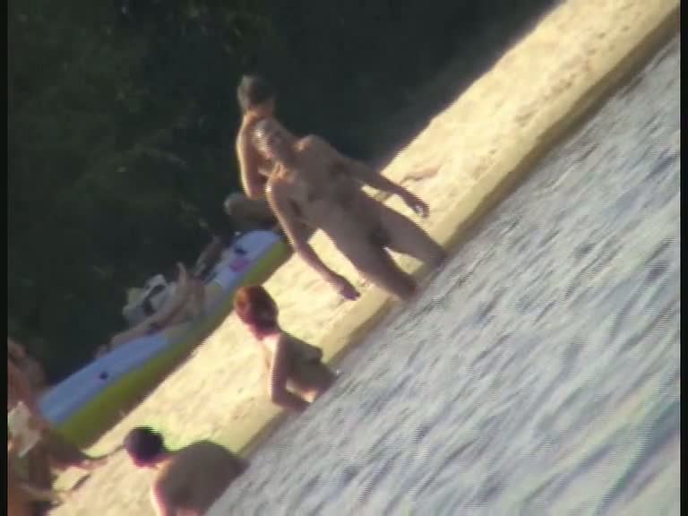 A horny voyeur loves filming hot nudity on the beach.