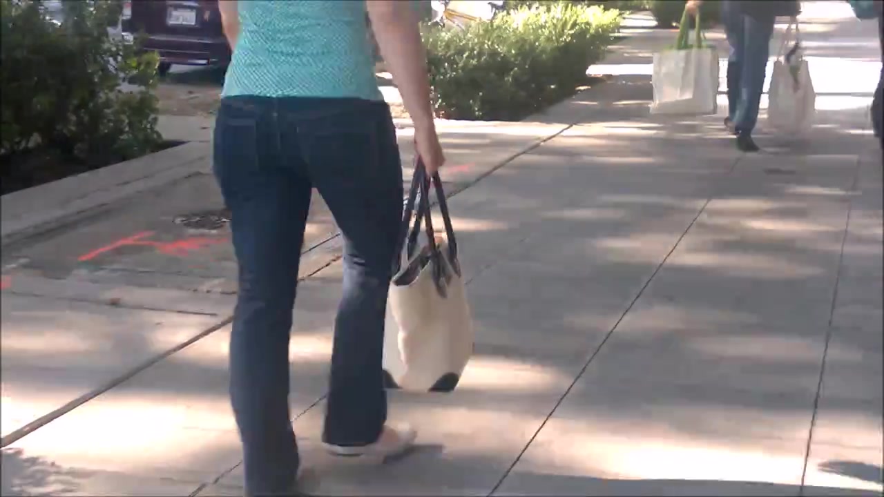 Cute short milf with a tight bubble butt in tight jeans