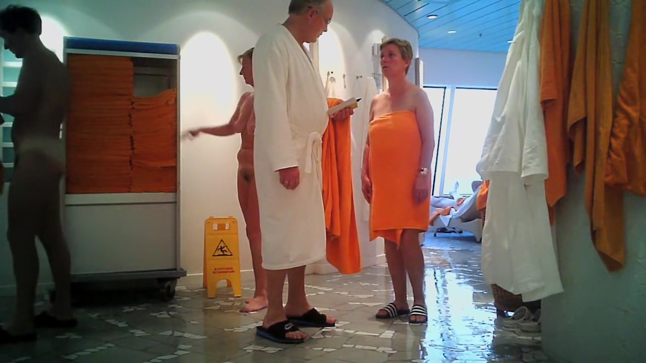 Girls in changing room are in bath robes and also naked
