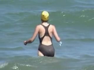Real amateur milf in black swimsuit on candid voyeur video 06n