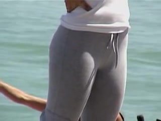 Long haired cutie with big candid ass spied on the beach 01zr