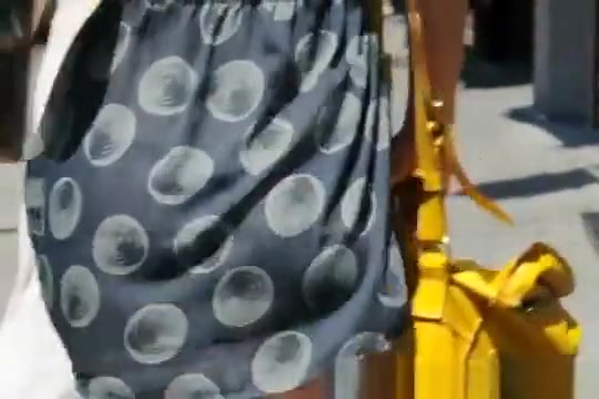 Woman Wearing See Through Dress in the Streets