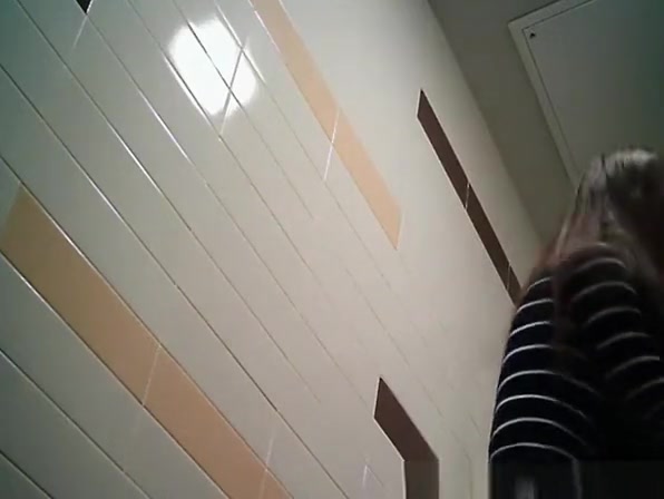 Teen in public toilet pissing