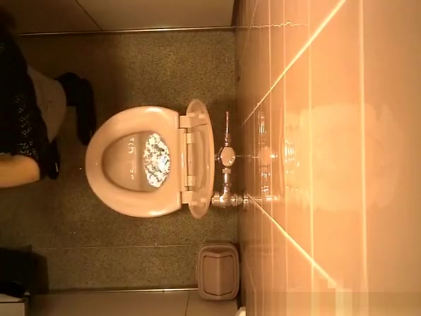 Public toilet ceiling catches women pissing