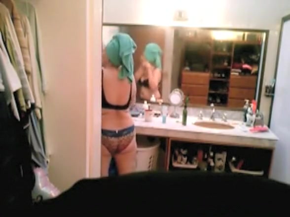 Milf caught after taking shower