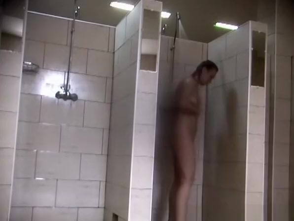 Woman taking a shower in shower room