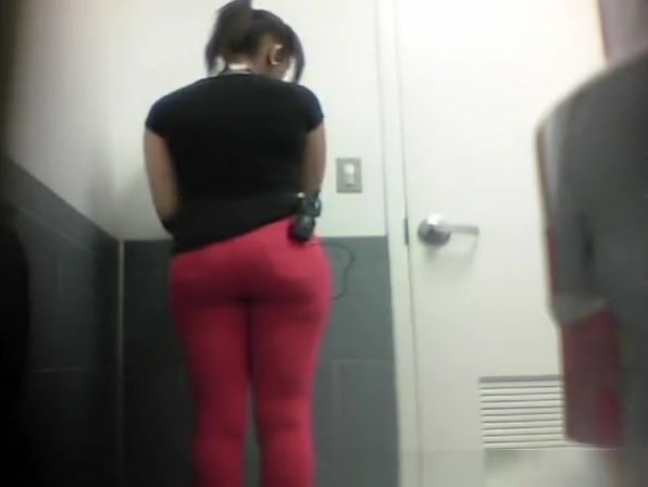 Ebony girl caught peeing in toilet