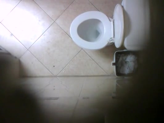 Cute teen caught peeing in toilet