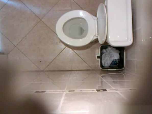 Hidden cam in public toilet ceiling