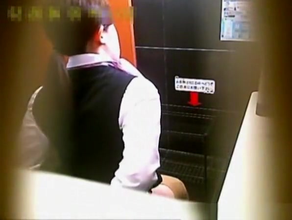 Asian co-workers spied in office toilet