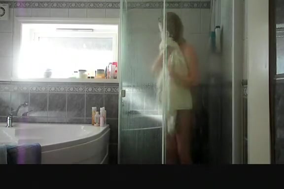 Blonde teen films her self in bathroom showering