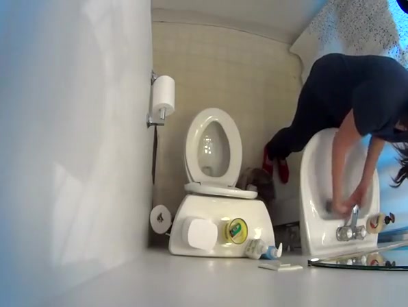 Hidden cam over the toilet catches woman peeing
