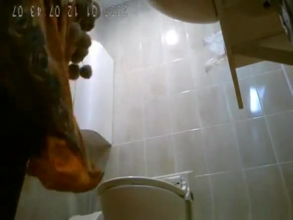 Japanese women caught by hidden spy cam in toilet