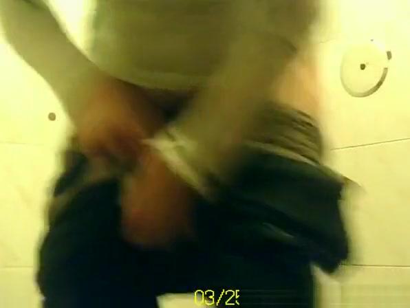 Woman pulls down pants to pee