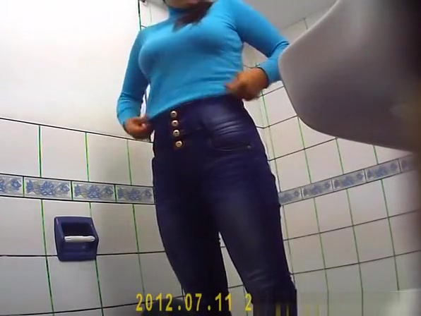 Girl with glasses takes a pee