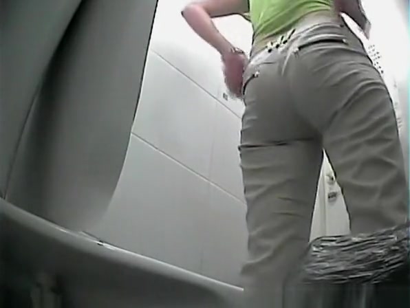 Nice ass chick spied in public toilet pissing
