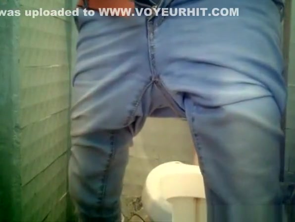 Small bush woman peeing in toilet