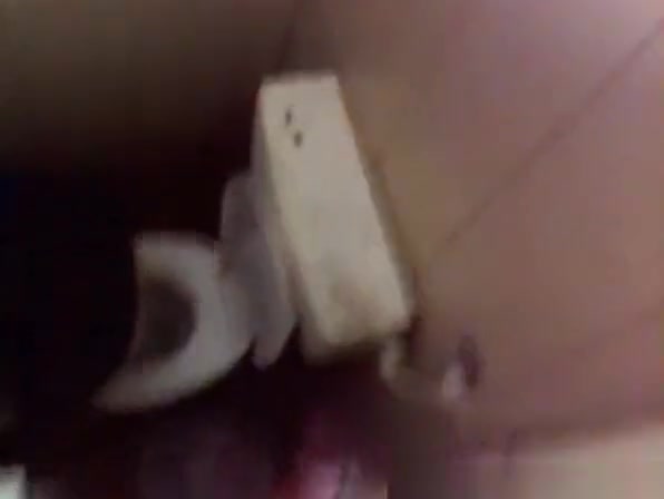 Voyeur filming over the toilet division women peeing