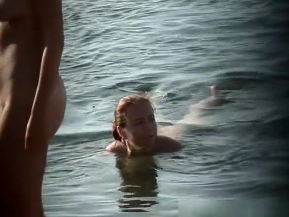 Nudist woman in water