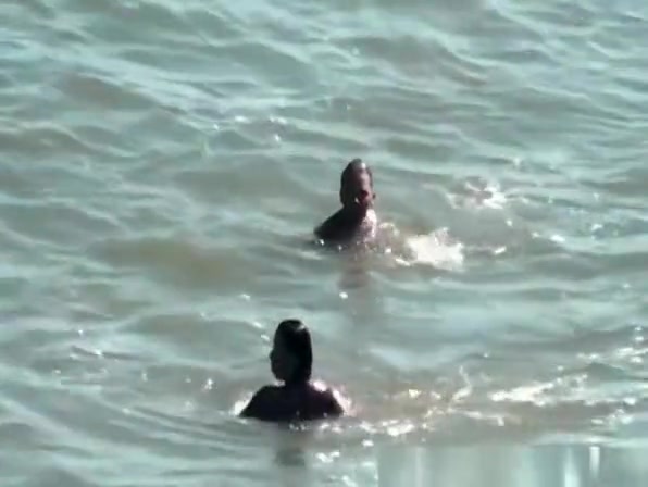 Nudist women in the water