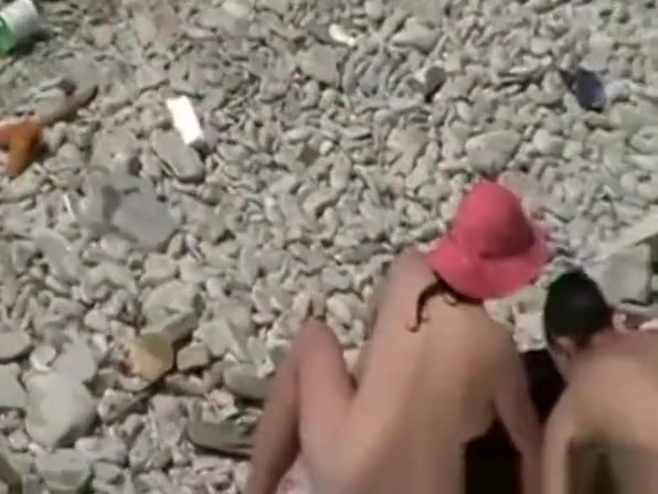 Nude man spills drink on woman's ass