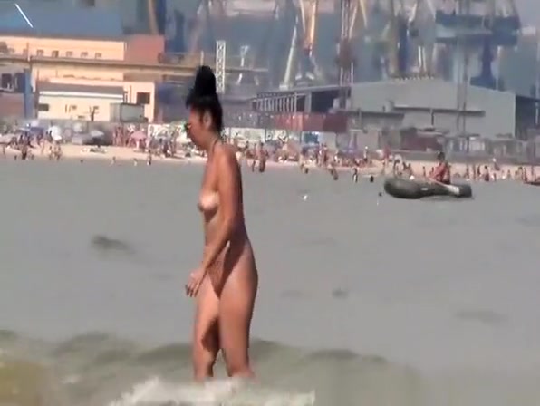 Topless and nude friend at beach