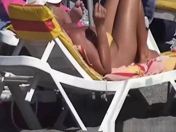 Topless women enjoying the sun