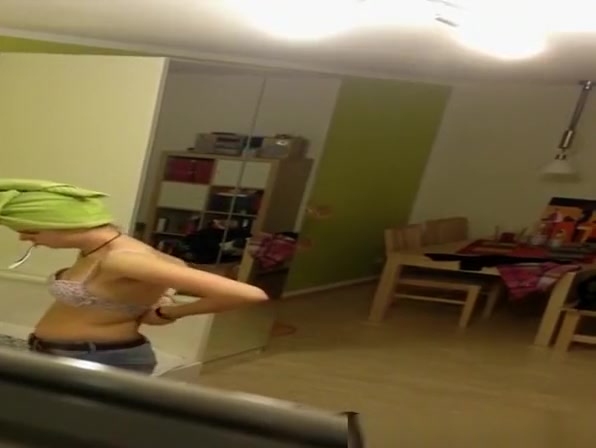 Neighbor spied in her apartment topless