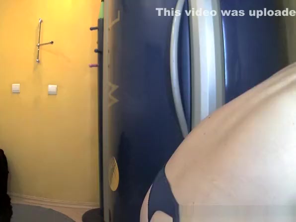 Small boobs woman spied in tanning room