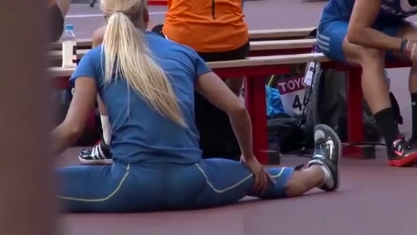 Sexy blonde athletic warming up