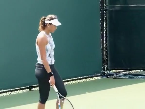 Tennis player wearing spandex pants