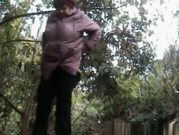 Chubby granny caught pissing outdoors