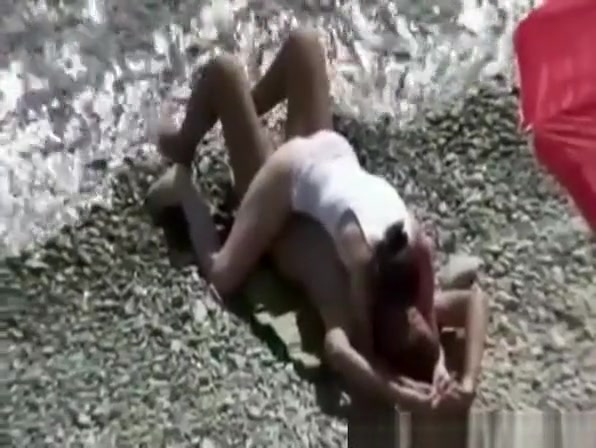 Small breasts woman fucked in rocky beach